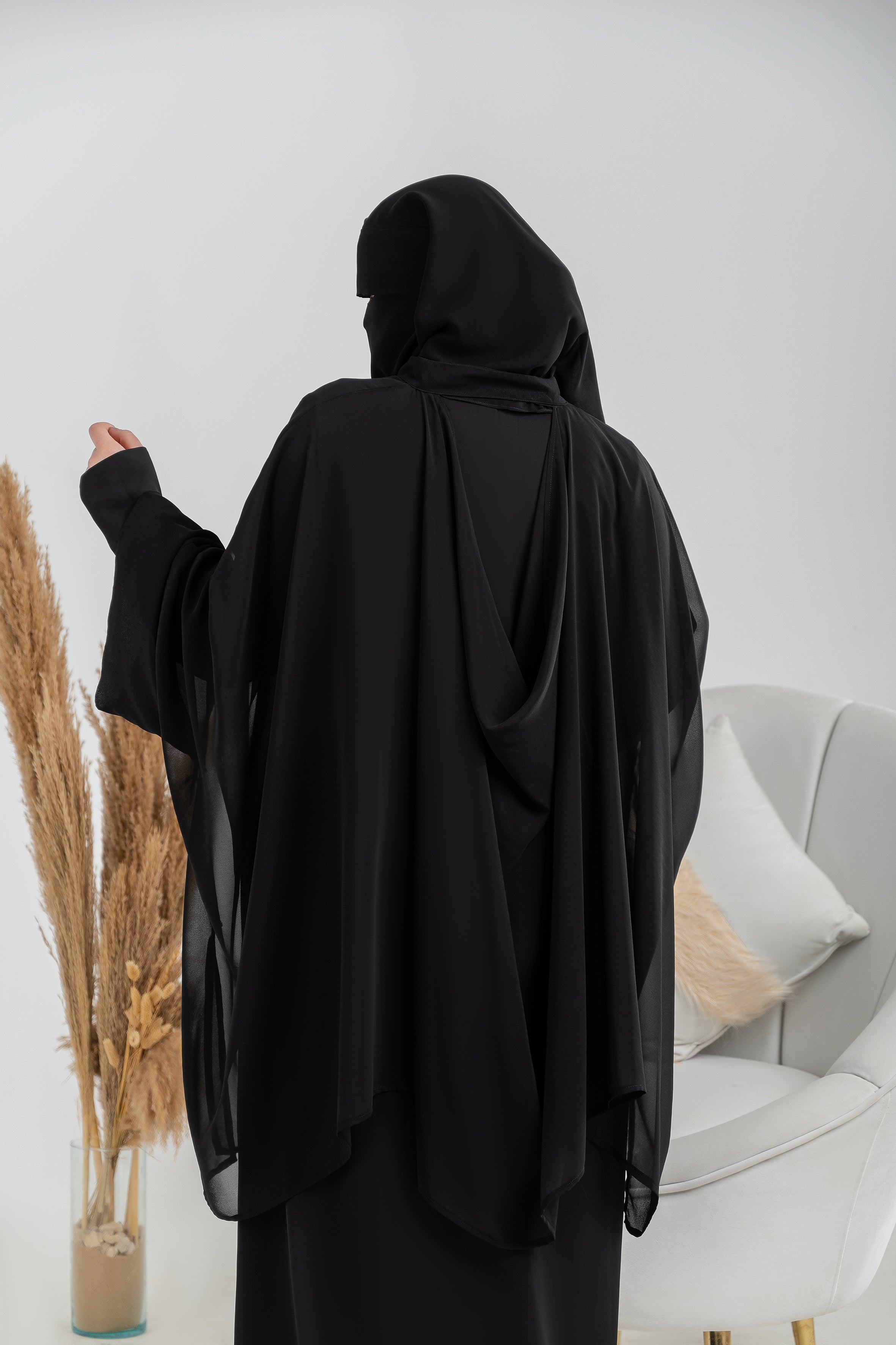 Chiffon blouse with draped back