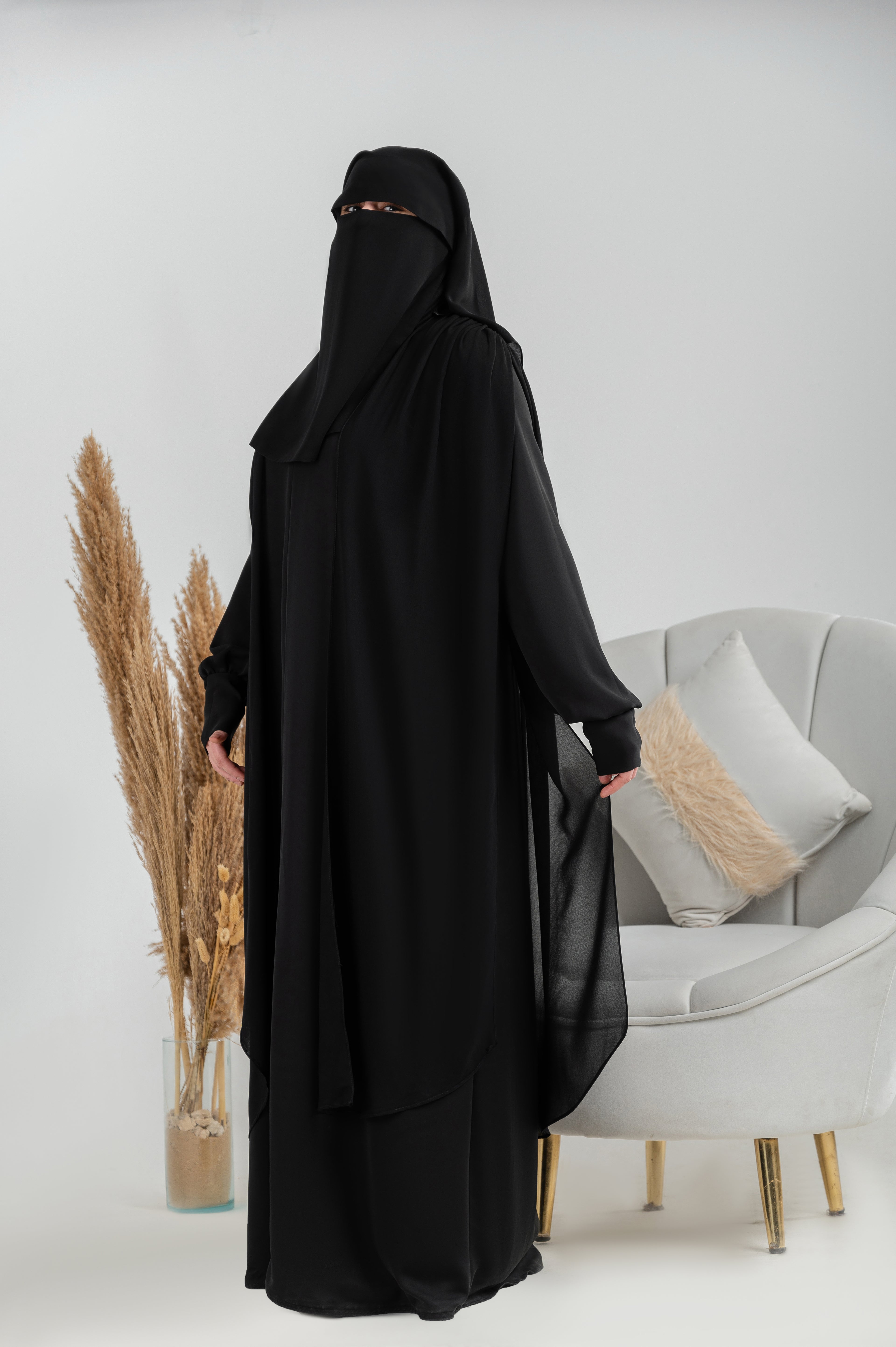 Ruffled shoulder cape