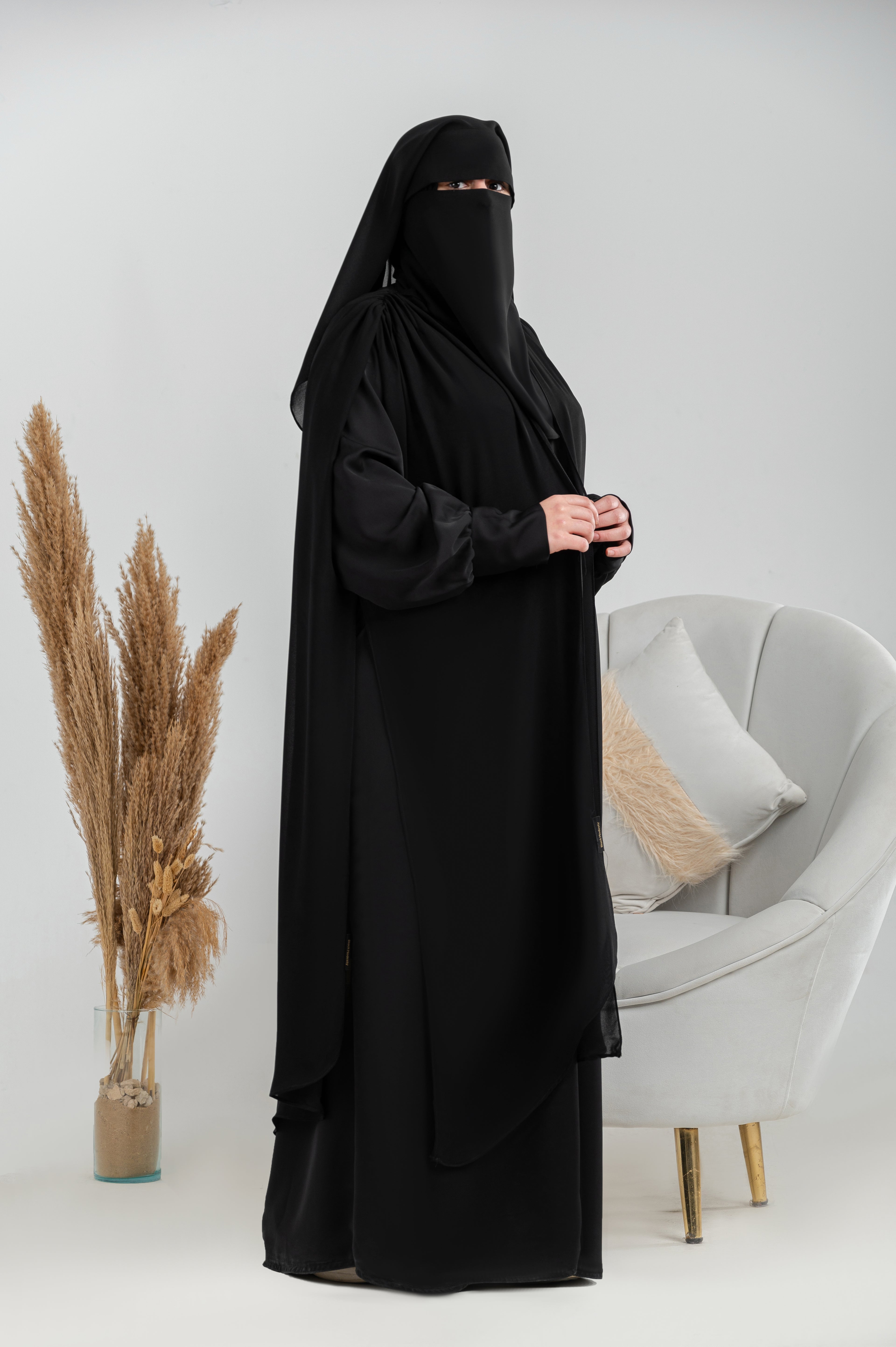 Ruffled shoulder cape