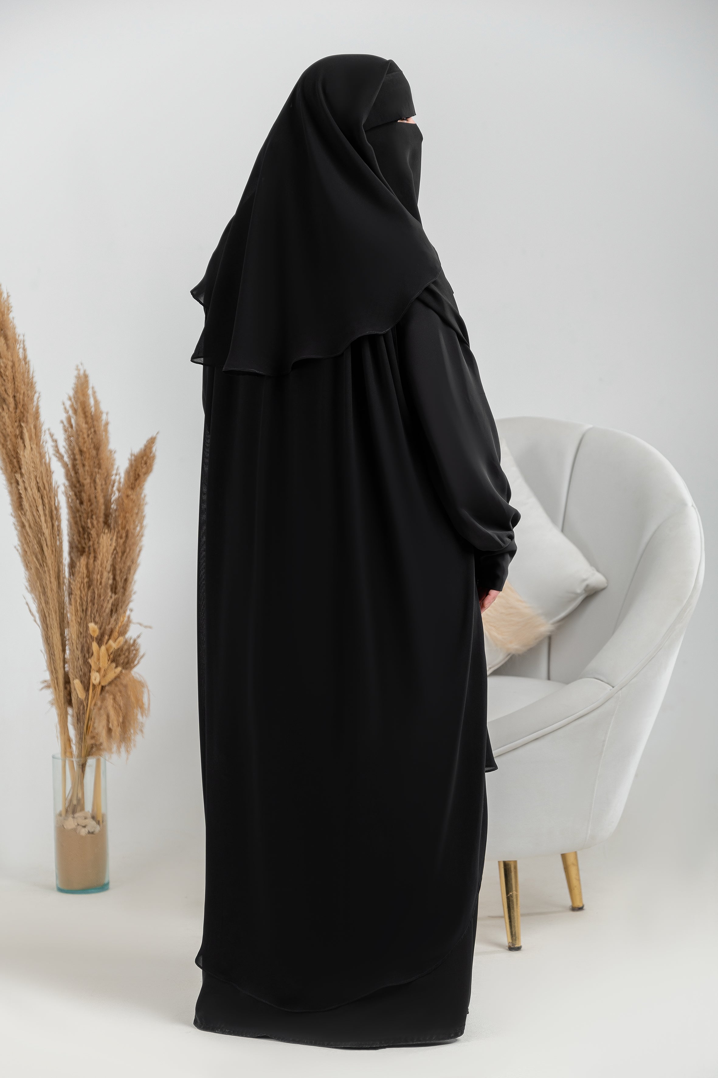 Ruffled shoulder cape