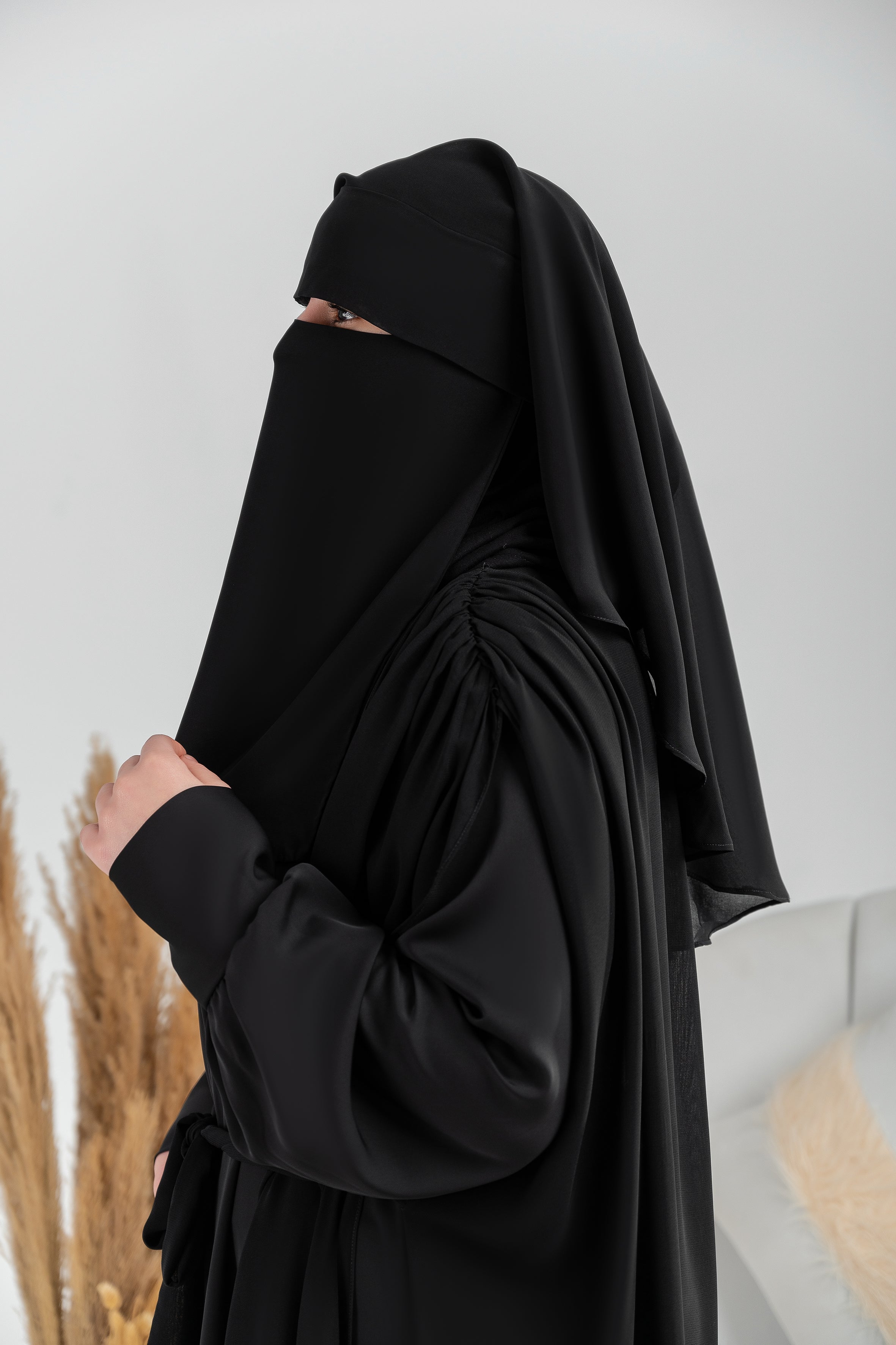 Ruffled shoulder cape