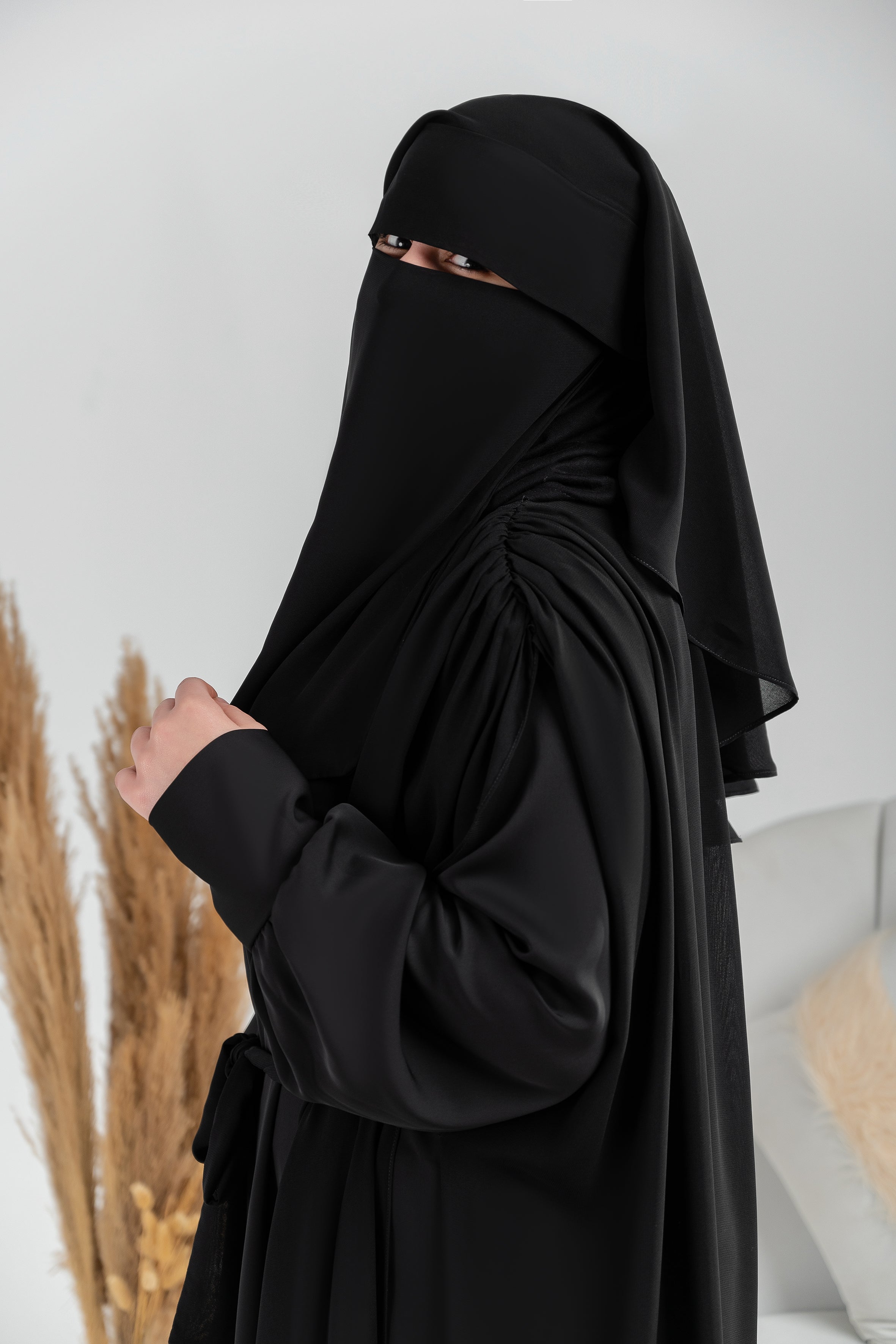 Ruffled shoulder cape